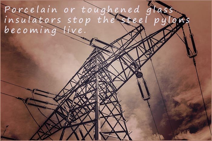 Electrical insulators on high voltage pylons stop the metal pylons becoming live